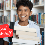 A kid is holding books in front of bookshelves' filled with books