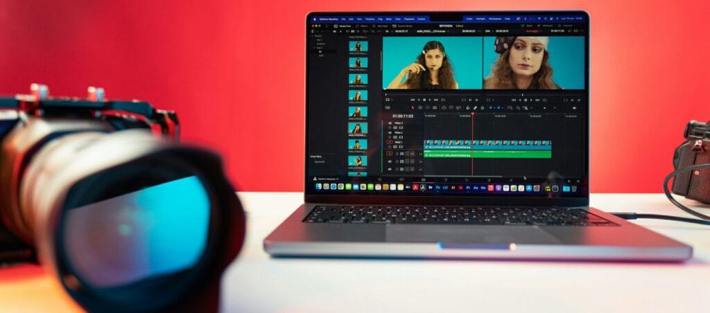a laptop computer sitting on top of a table