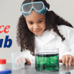A girl student is making an experiment, using science tubes.