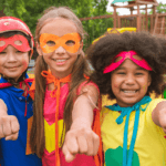 Five kids are in super here t-shirts and customs