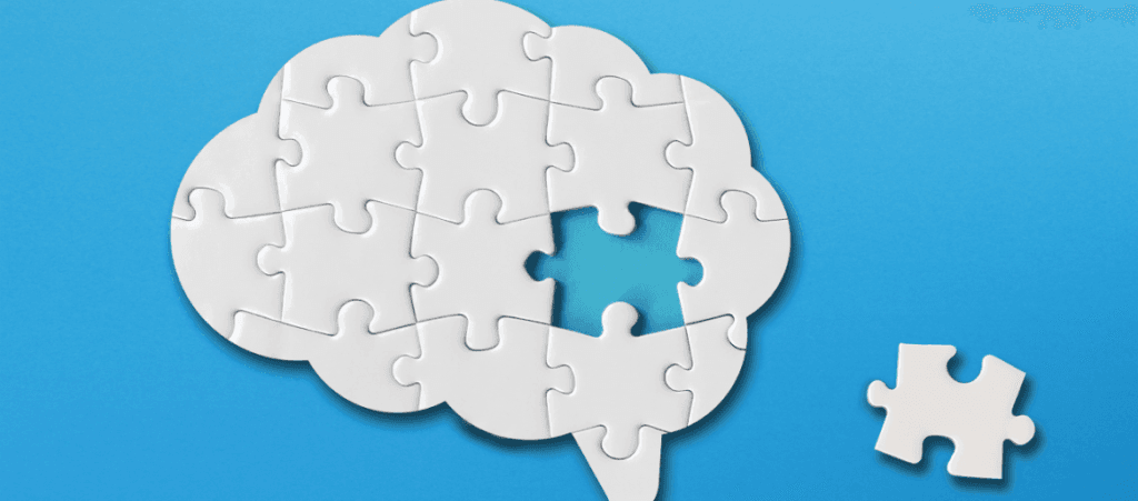 A puzzle looks like a brain and one piece is not attached