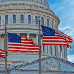 Congress building behind the flags.