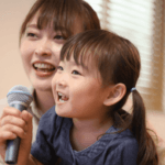 Mom and daughter singing